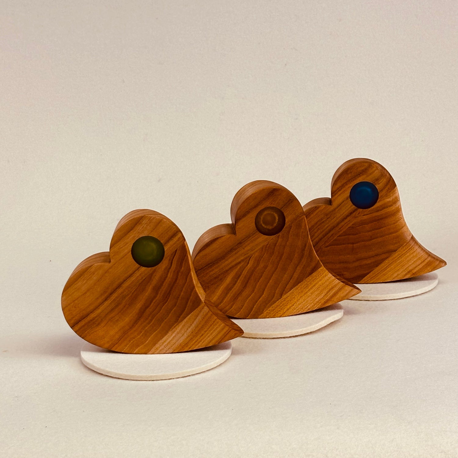 Erinnerungstück passend zu einer Holzurne in Herzform